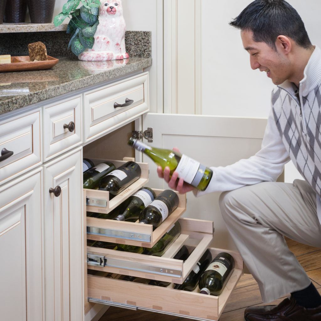 Storing wine in a cool, dark cabinet using the Wine Logic in-cabinet wine rack keeps your wine fresh.