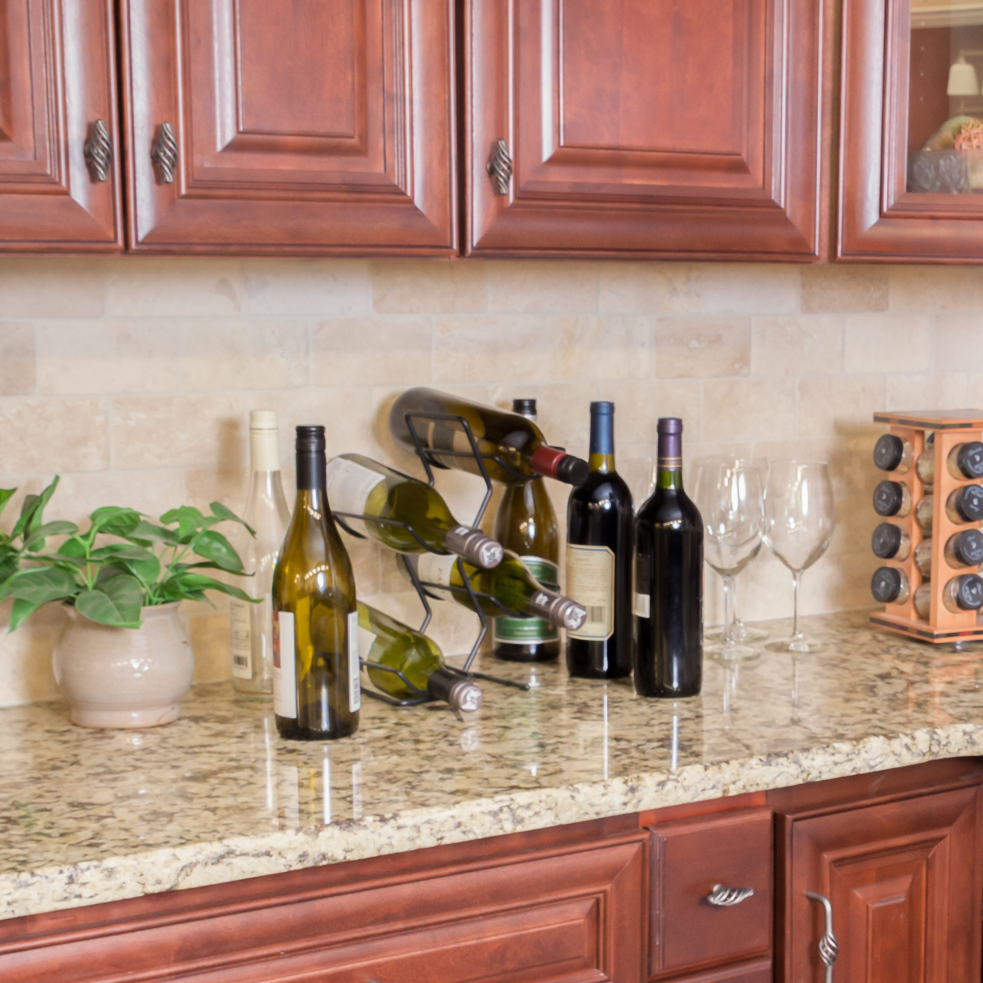 Cluttered countertops are a thing of the past when you store your wine in an in-cabinet wine rack.